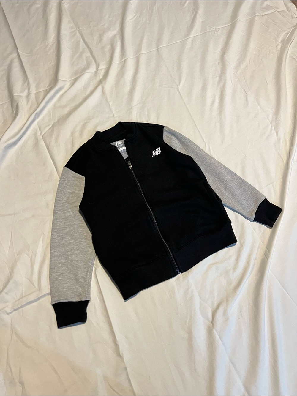 New Balance Men’s Black Body with Gray Sleeve Zip-Up Sweater